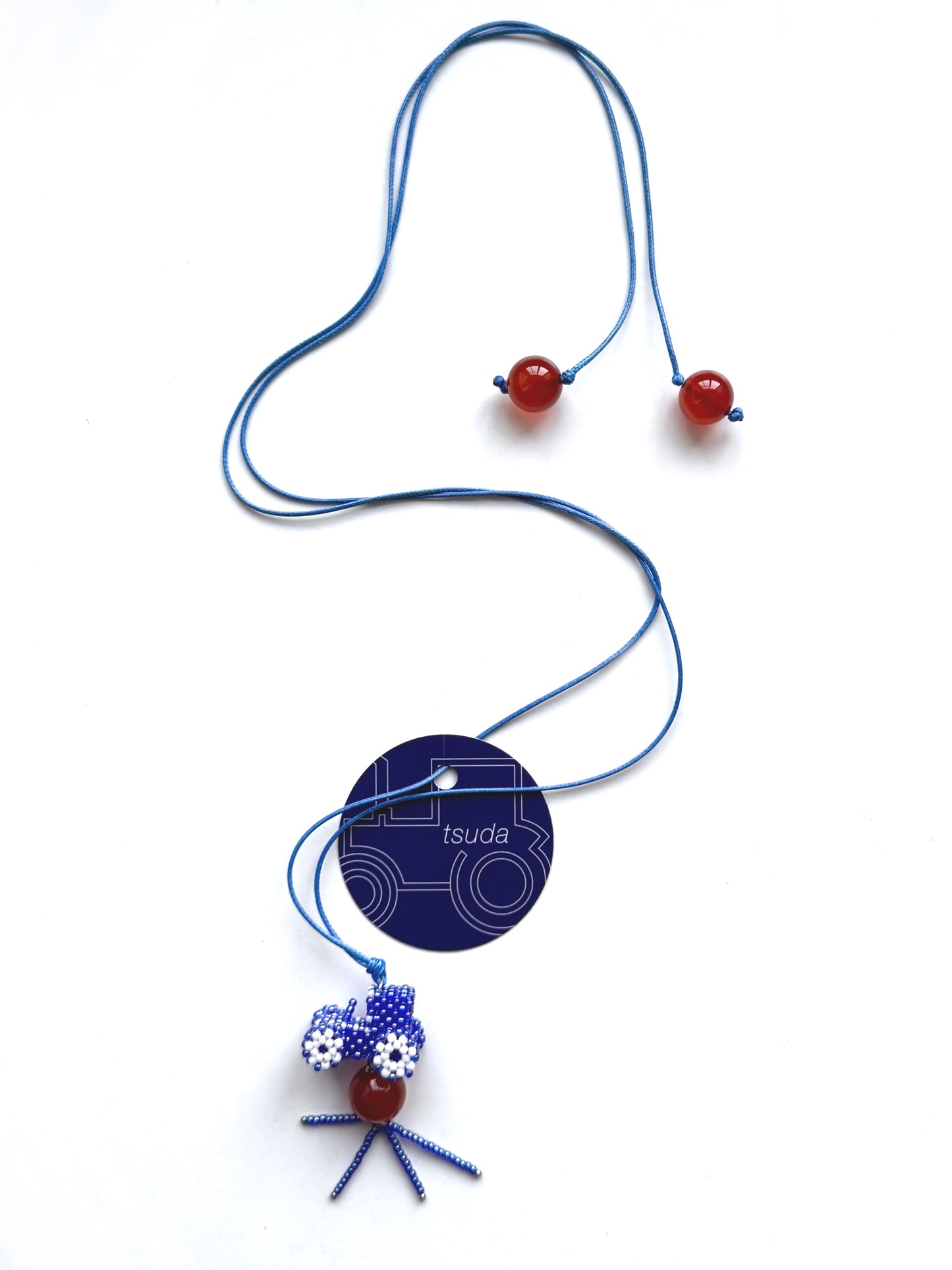 Long tractor pendant