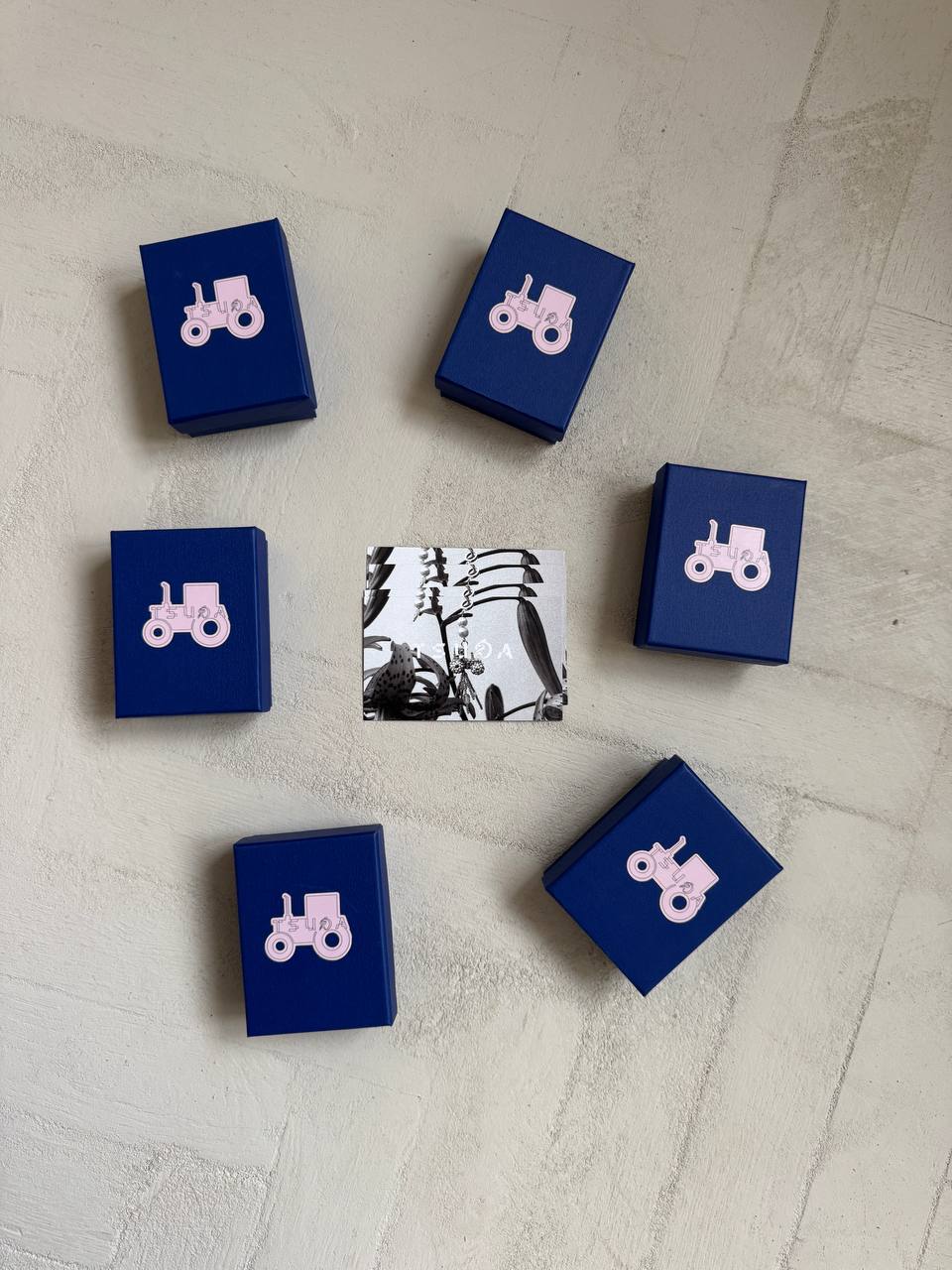 Pearl necklace with tractor