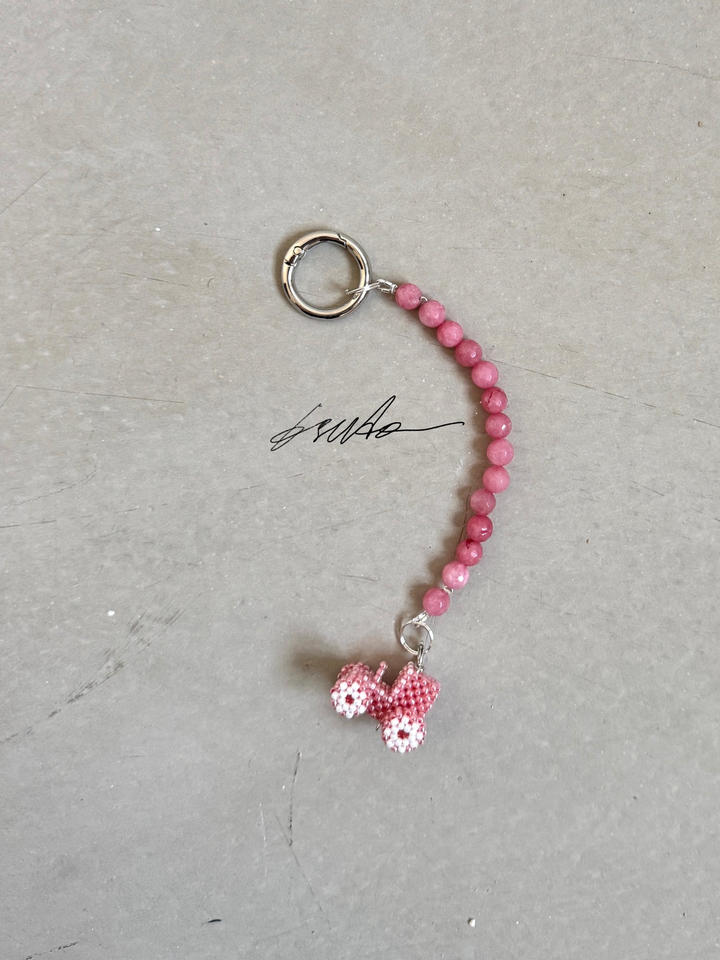Keychain with clasp and a tractor