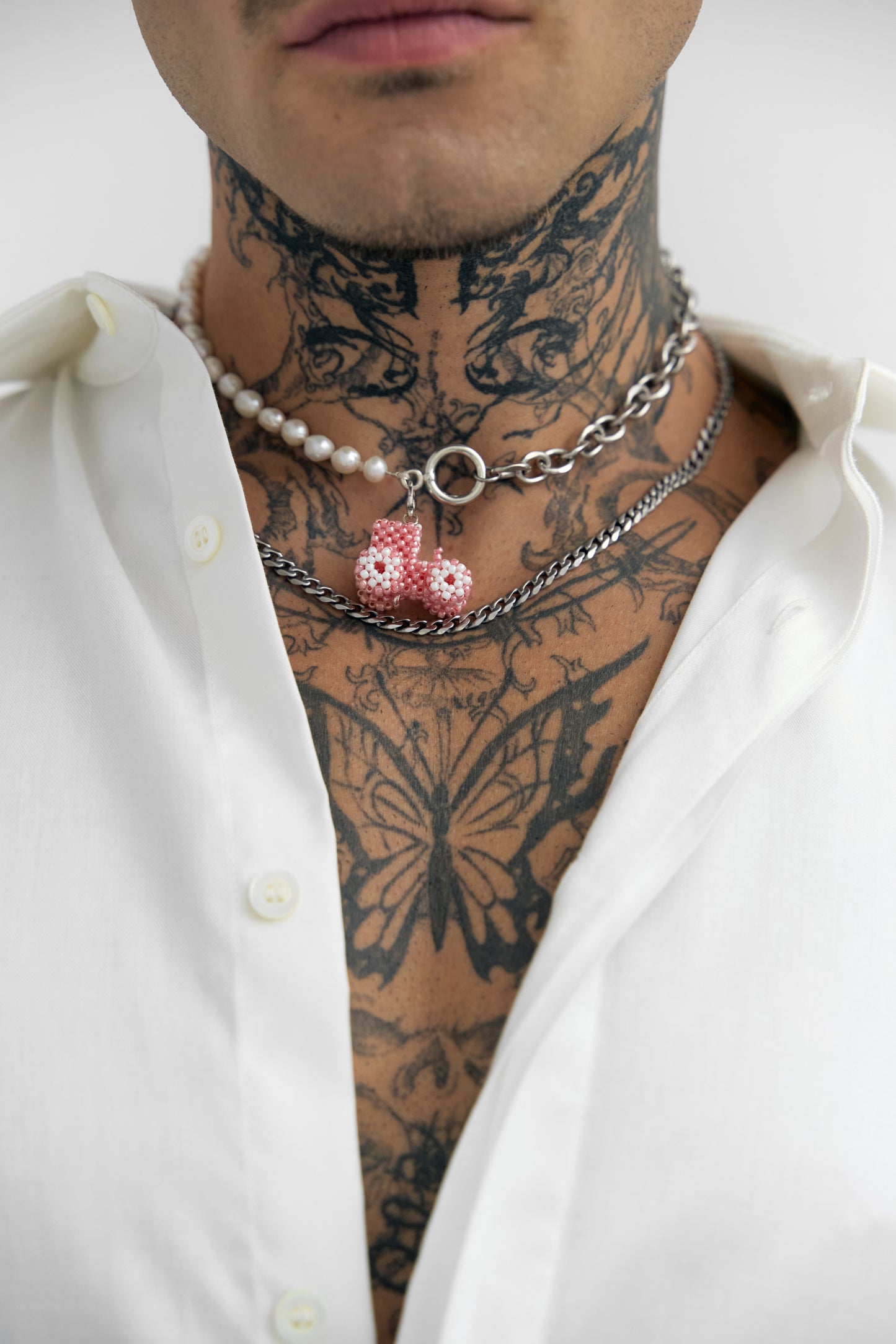 Pearl-steel necklace with a Tractor