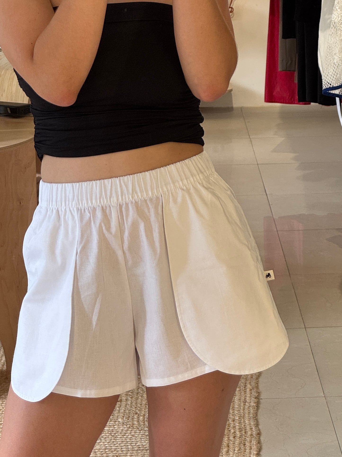 Shorts with outer pockets