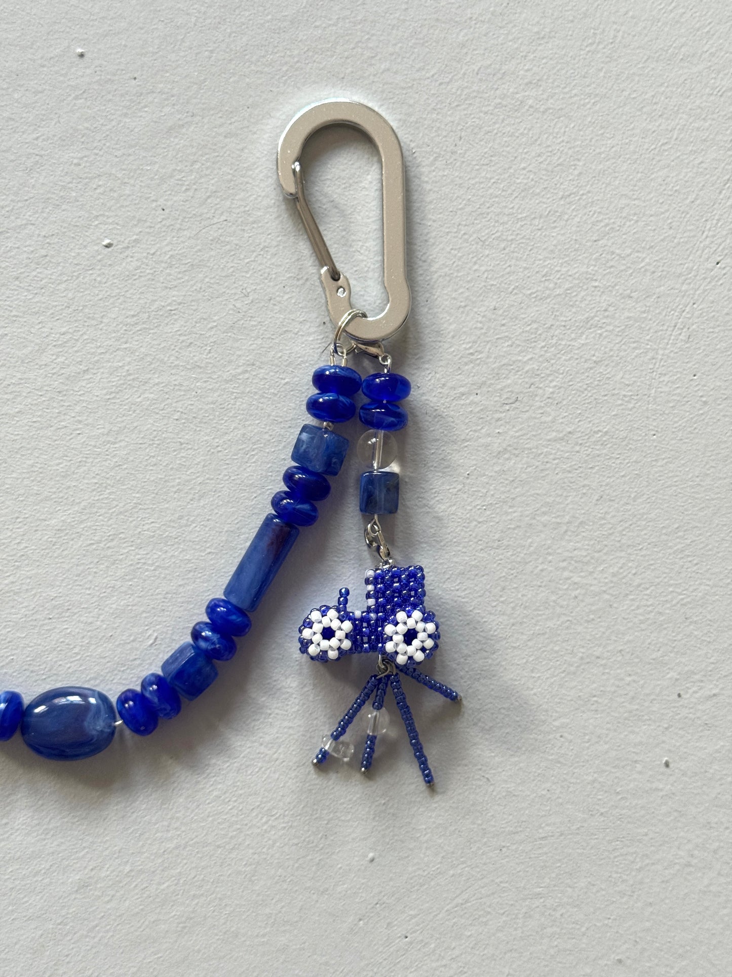 Keychain with 2 clasps and a tractor