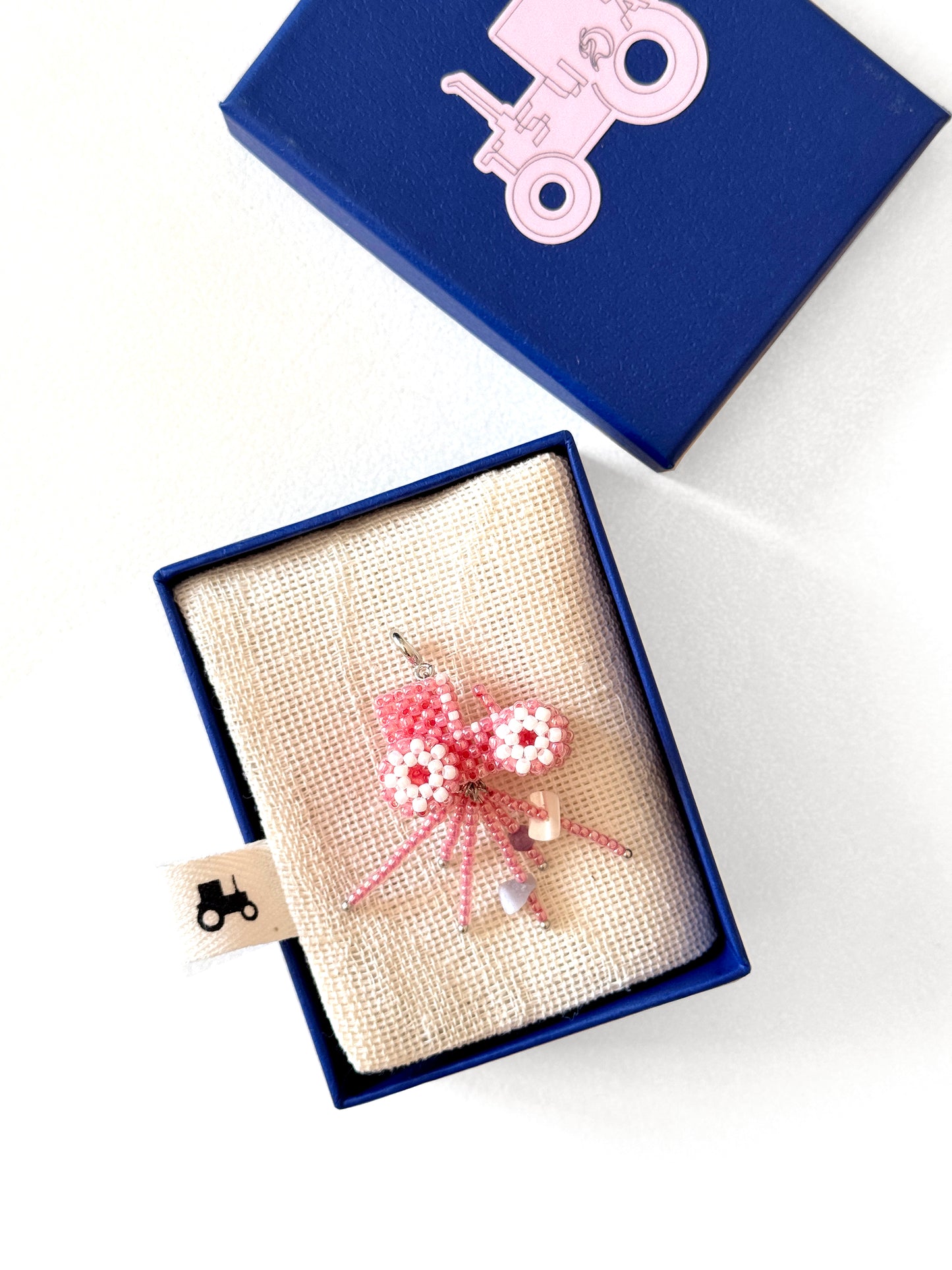 Pearl-steel necklace with a Tractor