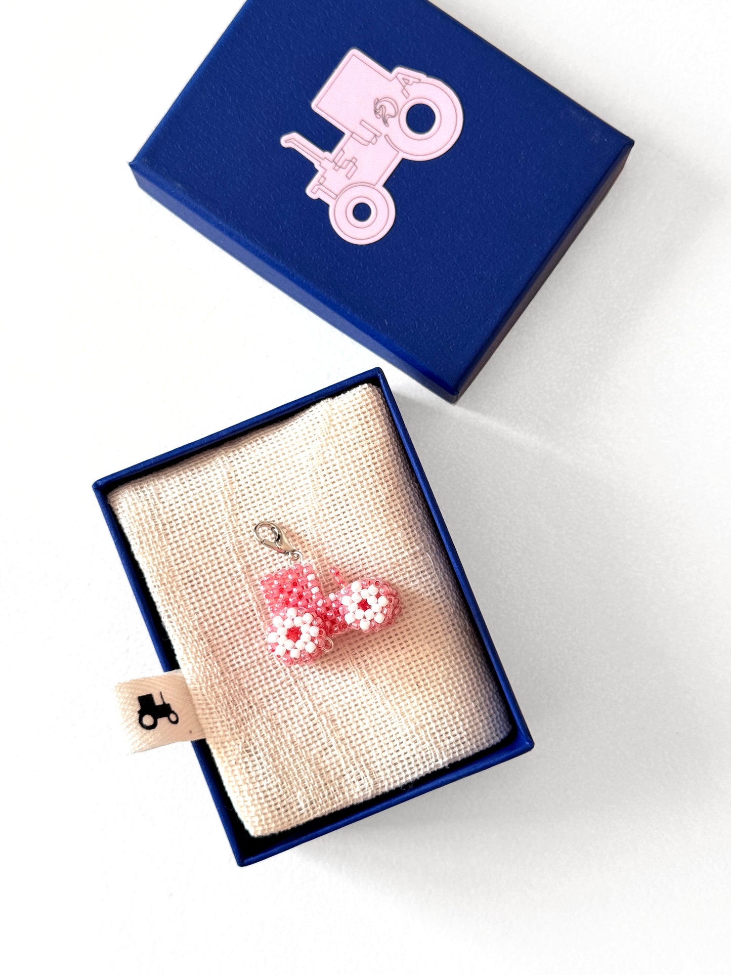 Pearl-steel necklace with a Tractor