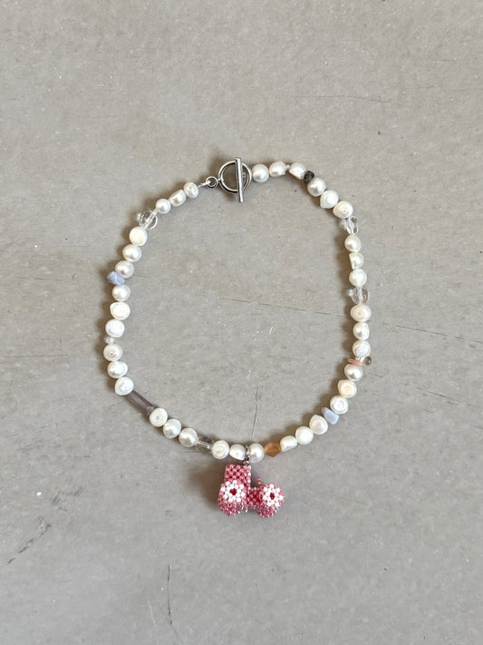Pearl necklace with a mix stones and Tractor