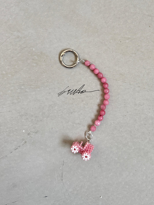 Keychain with clasp and a tractor